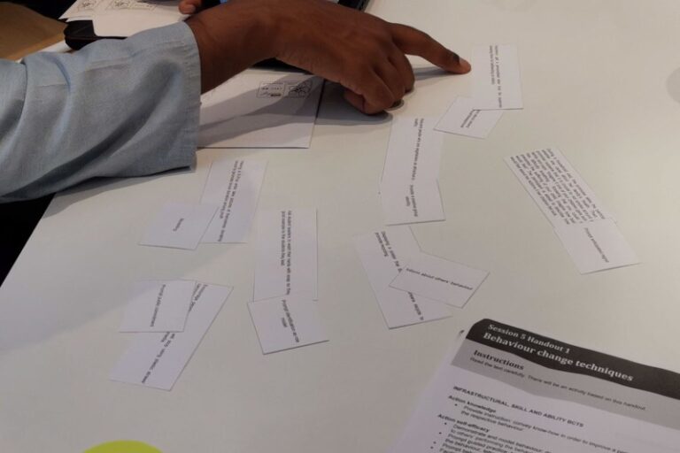 Volunteers engaging in Behaviour Change Hackathon session.
